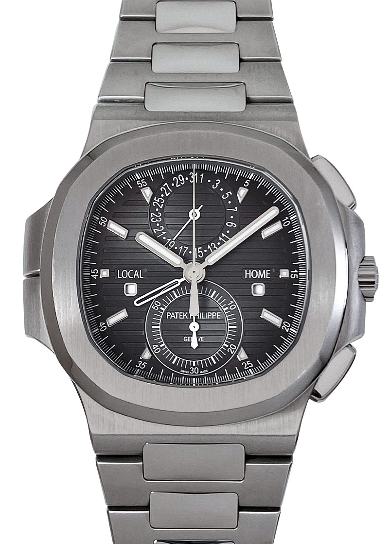 Patek Philippe - Nautilus Travel Time Chronograph| PATEK PHILIPPE| 5990 / 1A - 001| SS Black Clock Automatic Winding Bracelet| Commissions| Middle Ages Patek Philippe - Nautilus Travel Time Chronograph| PATEK PHILIPPE| 5990 / 1A - 001| SS Black Clock Automatic Winding Bracelet| Commissions| Middle Ages - Image 1